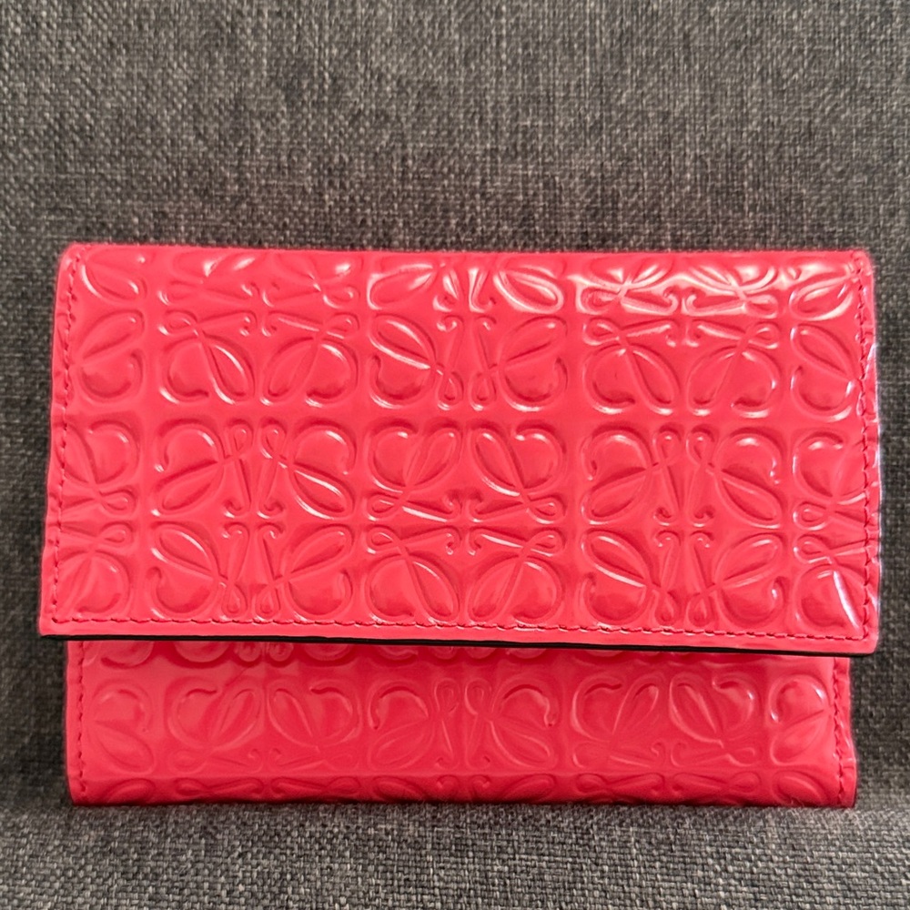 Pre owned luxury Loewe Embossed tangerine wallet